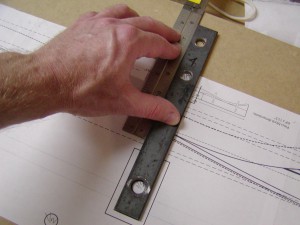 Placing the straps on the blueprint and bow form